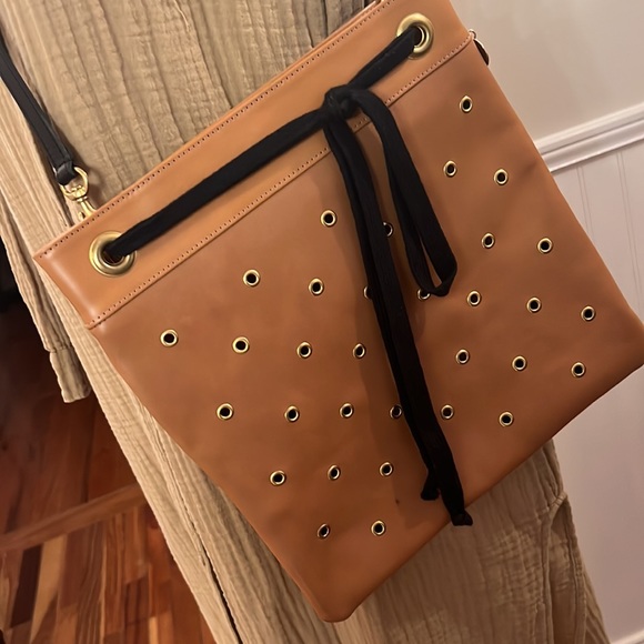 Clare V Delphine Bag with leather grommets and black leather strap. - Picture 1 of 16